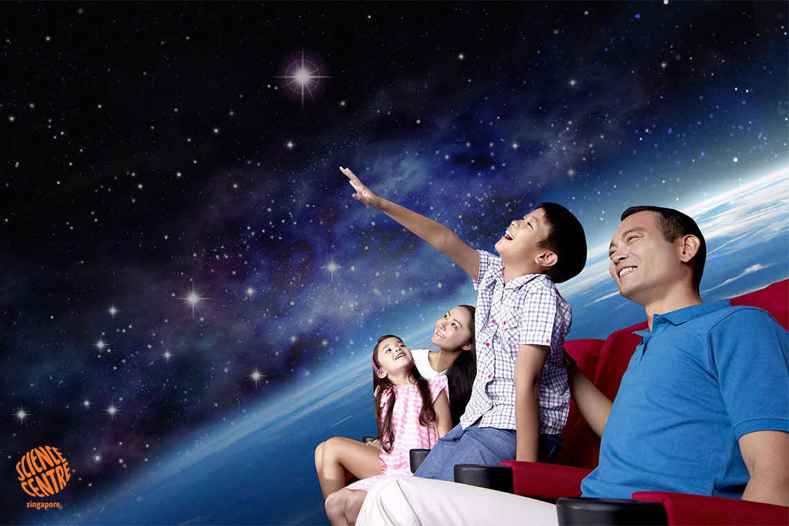 A family in the digital dome theatre
